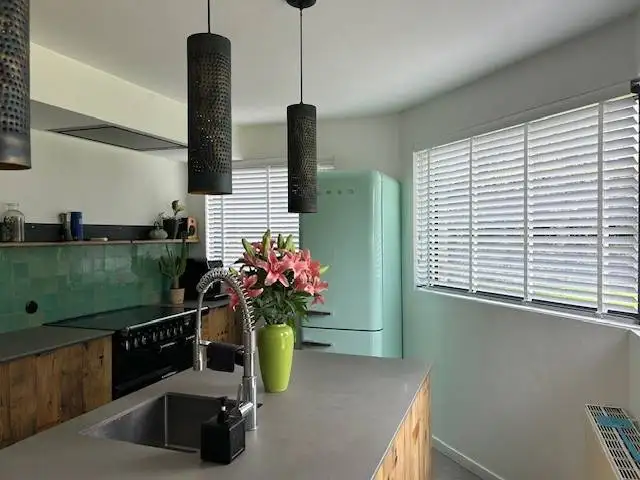 Houten jaloezieën met ladderband